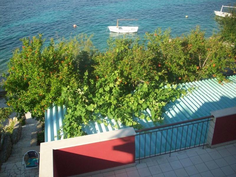 Apartments Tomovic Lumbarda Habitación foto
